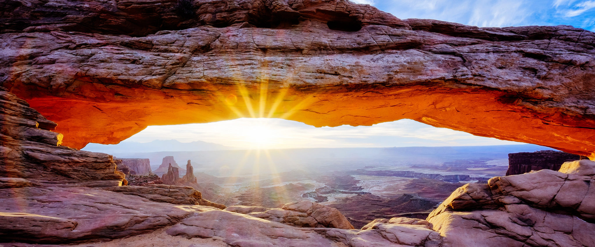 A bit of a photo cliche, but there you go. Couldn't leave Canyon lands without heading to Mesa Arch at sunrise - it's only a 10 minute walk from the car park, and is stunning in the early light. It's not the biggest or most dramatic of the stone arches, but the reflecting sunlight early in the morning makes it look like it's glowing red and orange. Photo credit: Robbie Shade via Flickr