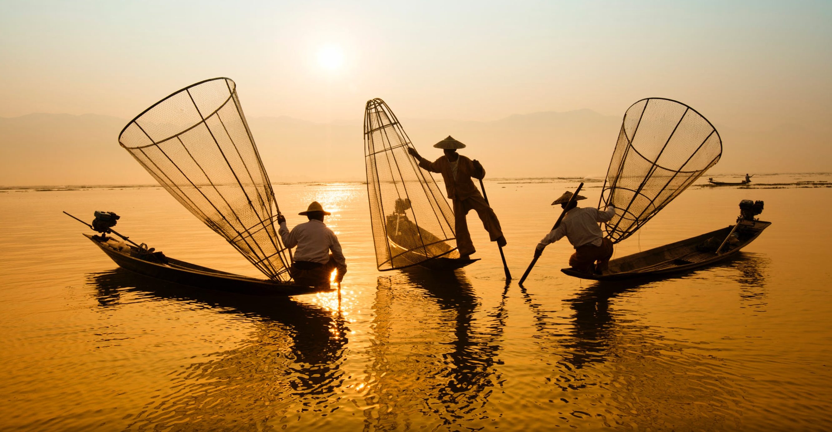 Three men fishing. (Vietnamese Private Tours; 2015)