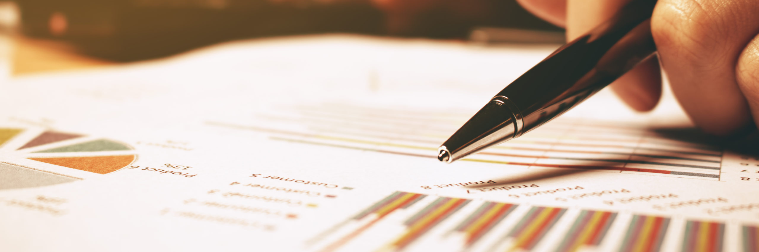 Hand woman holding pen pointing on summary report chart and calculate finance. - Image