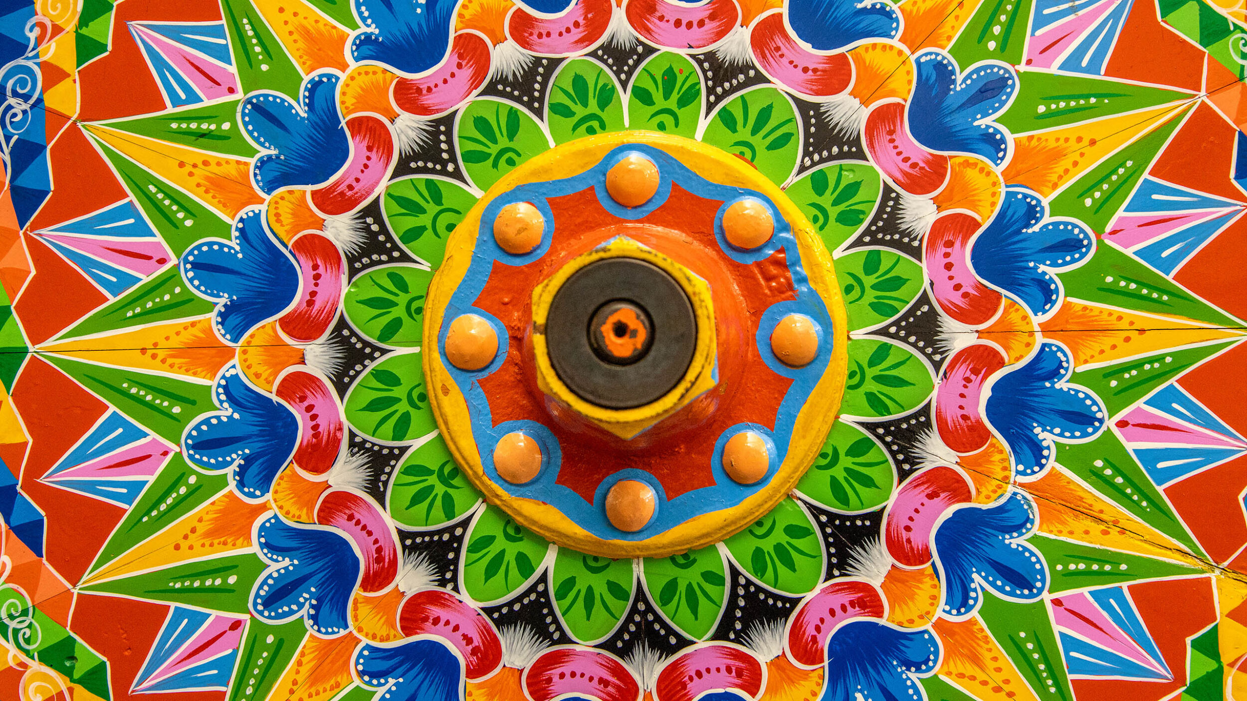 Painted wooden wheel from a traditional Costa Rican ox cart