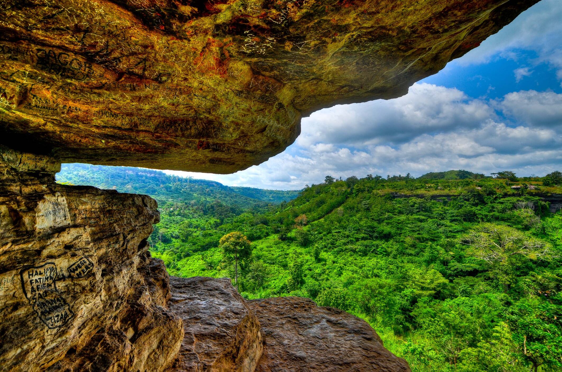 View from Umbrella Rock in the Yilo Krobo District, outside of Accra, Ghana. The Umbrella Rock is situated on a high land making it possible to watch nature hundreds of miles away into the green.