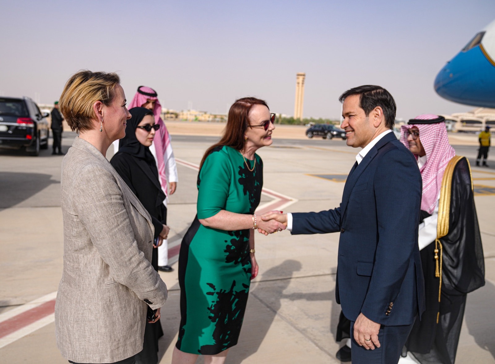 S meets with officials.